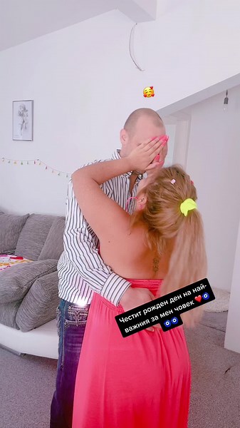 Romantic Embrace in Modern Living Room Setting