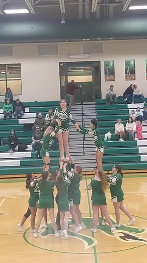 I began to pass out..... She's okay we promise! 💚 #cheer #fail #cheerleading #highschool #gameday #stunting #stunt #stunting #cheerleader #basketball