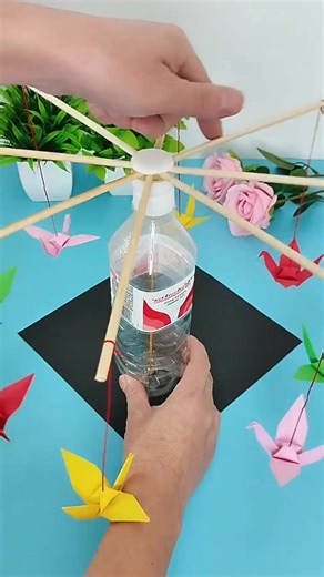 Plastic Bottle Wind Spinner with Paper Cranes #windspinner #plasticbottlecraft #papercranes #diy #handmade #creative #upcycle #recycle #decorcraft #papercraft | paper craft ideas