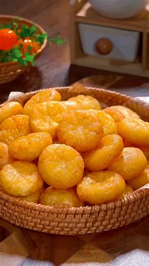 Crispy Potato Biscuits Serves: 2–3 | Prep Time: 10 min | Cook Time: 10 min Ingredients 2 medium potatoes, boiled and mashed ½ tsp salt A pinch of black pepper 1 cup all-purpose flour Oil, for deep-frying Ketchup, for serving Instructions 1. Boil & Mash: Boil potatoes until soft. Peel and mash smoothly. 2. Season: Add salt and black pepper. Mix well. 3. Add Flour: Add all-purpose flour and knead into a soft, smooth dough. 4. Shape: Take small pieces, flatten into discs. Press gently on a strainer
