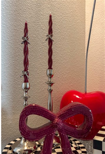 This tiny detail changes everything ✨🕯️ Silver metallic bow candle shapes = instant candle upgrade. Affordable, easy, and works with any candle color. Comment BOW for the link #homedecorideas #candles #bow #homedecor #charms