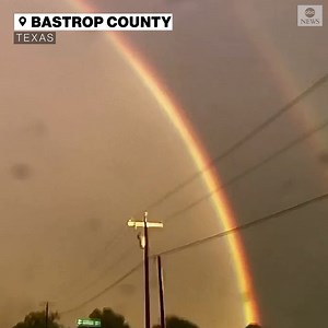 21K views · 404 reactions | Lightning struck in Bastrop County, Texas, next to a double rainbow as thunderstorms moved through the area. https://abcn.ws/3wgVH6Y | ABC News | Facebook