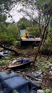 The City of Fall River cleared up the encampments near Kennedy Park yesterday. They used heavy equipment to clear a path to some of the harder-to-reach areas. | Fall River Reporter