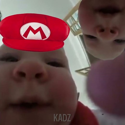 Baby eats camera and sings the Mario Bros Theme Song meme