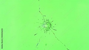 Super Slow Motion of Shattered Glass Isolated on Green Background. Break Glass from the Gunshot. Filmed on High Speed Cinema Camera, 1000 fps. Stock Video