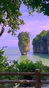 James Bond Island, also known as Ko Khao Phing Kan, is located in Phang Nga Bay, Thailand. It gained its popular nickname because it was featured in the 1974 James Bond movie "The Man with the Golden Gun," starring Roger Moore as James Bond. The island's unique limestone karst formations rising dramatically from the water, along with its stunning natural beauty, made it a perfect filming location for the iconic movie. The scenery and the island's distinctive shape became synonymous with the Jame