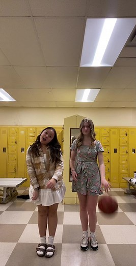 Basketball Fun: Young Girls in Locker Room Action