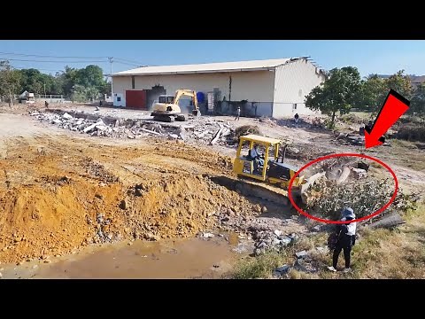 Construction Site Action: Bulldozer Clearing Debris