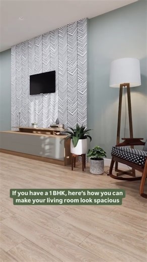 Here’s how you can ace your living room setup if you have a 1 BHK! 🏡✨ ✅ Swap bulky sofas for a sleek three-seater, a chic round table, and a statement chair for that stylish pop. ✅ Maximize storage with wall-mounted shelves that don’t eat up floor space. ✅ Keep it clean and modern with a cohesive color palette that ties it all together. [ Living room, Home Interiors, Interior Design ideas, Modern Interiors ] | HomeLane