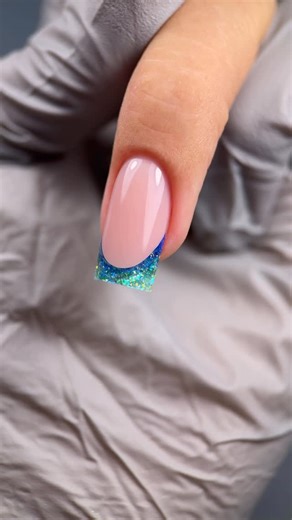 Kodi Professional on Instagram: "New French Nail Design 🔥 Materials used: - Camouflage Jelly Gel 02 - Gel Polish 01BW - Pigments - Rainbow Gel 01 - Yuki Flakes - No Sticky Top Coat #nailsnailsnails #kodiprofessional #kodiprofessionalusa #kodi #manicure #naildesign #fyp #french #frenchnails #greenfrench #bluefrench #trendingnails #nailtutorial"