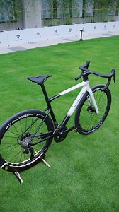 The panda color scheme of the FALCON SLR7 complements the great outdoors perfectly. #SAVA #launchday #newbike #newbikeday #GoFurther | SAVA Carbon Bike