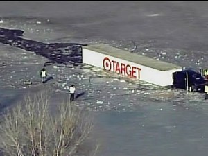 Truck crashes into icy pond in Minnesota