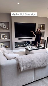 Here are the media wall dimensions! Also answering the most asked questions ⬇️⬇️⬇️ The fire is the Halo 1800 from @evonicfires The paint colour is Dove Tale from @farrowandball The coffee table is from @wayfairuk The sofa and footstool are from @sofasandfriends and Louise5 will save you 5% off ❤️ The soundbar is on a pull out bracket. The bracket and the tv bracket are both linked on my media wall highlight ❤️ | Louise And All Things Home