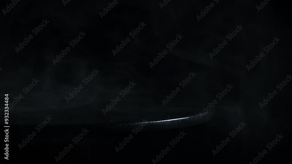 White smoke flying on table in darkness. A view of dark room with vapor flying on the table.