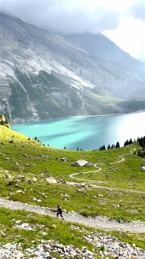 The stunning turquoise colors of Oeschinen Lake in the Swiss Alps. A must-see if you go. | Lukekellytravels