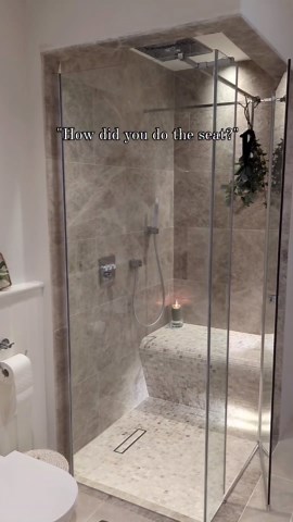 Samantha Roobottom on Instagram: "Still get so many questions about the shower seat - it's super easy to do as it's pre-made cast foam that you cut to size and tile over. It's the best thing about the bathroom and the one thing I would want to replicate in our en-suite if we ever get round to doing that! #bathroomdesign #bathroomremodel #showerseat #showerdesign #bathroompanelling Shower from @grohe_uk (AD)"