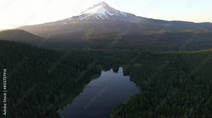 Beautiful 4k high resolution aerial drone video footage of Trillium Lake and Mount Hood in Oregon, captured at sunset time.