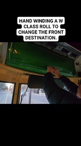 Hand winding a Melbourne W class tram destination roll to change the destination displayed on the front. There's no press a button and a destination changes. It's all manual hand power to move the roll to change the destination. Follow TramBook for more. | TramBook