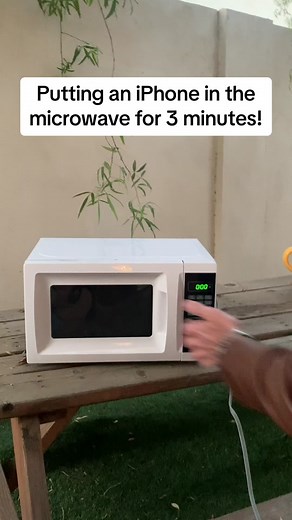 Putting an iPhone in the microwave for 3 minutes #science #scienceexperiments #iphone #microwave #viral