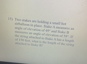 15) Two stakes are holding a small hot airballoon in place. Sta... | Filo