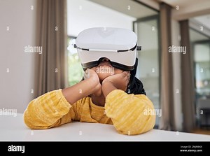 Vr, metaverse and child in virtual class for elearning, gaming or video streaming online in home. Futuristic education, entertainment and innovation Stock Photo - Alamy