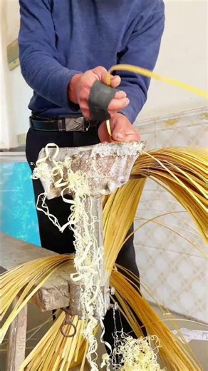 Traditional Bamboo Craftsmanship: Skillfully Shaving Cane Strips for Weaving
