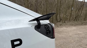 clip-1101366463-tesla-model-3-charge-port-automatically-opening