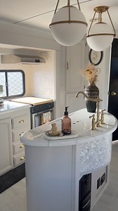 Hey! I’m Tessa 👋 Recently I hit 125k followers across all platforms and if you’re new here, let me introduce myself! 5 years ago I purchased my first camper on FB Marketplace for 6k. I had a vision to create a homelike space, that would still travel and function as a camper. That vision came to life, I sold that rig for 35k in under 24 hours with a waitlist behind the buyer. That’s when Alchemy was born. My husband quit his salary job, and I pursued what I loved most - designing and working wit