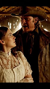 ✨ They Chuckled When the Deaf Bride Walked In—Until the Rancher Spoke Up: “She’s Worth More Than All of You Combined…” In 1879, the dusty church at Deerhorn Crossing, Montana, was filled with a "stale breath" of cruelty. Elena stood at the altar, a small, pale figure clutching a dried bouquet, her lace gloves trembling. She couldn’t hear the whispers—“She can’t even hear the vows!”—but she could feel the disdain radiating from the crowd. Then came the ultimate betrayal: her fiancé, Elijah, turne