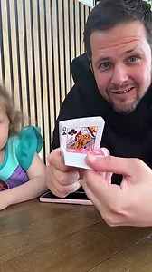 Father and daughter team up for a magic trick