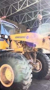 Part 1: The steps for placing the boom and arm of the ZL40 loader after bodywork and welding