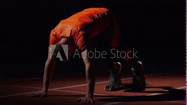 Sprinter Runner Preparing To Start Of Sprint Running, Man Putting Feet Into Starting Blocks Stock Video