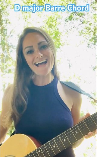 Beginner guitar lesson: How to play a D Major Barre Chord on acoustic guitar