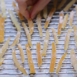 1.2K views · 52 reactions | RECIPE: https://www.inthekitchenwithmatt.com/candied-orange-peel Learn how to make candied orange peel at home. This is a great way to make those citrus peels edible instead of just throwing them away. Also, you get flavored water and flavored syrup from it as well. #orangepeel #candiedorangepeel #candiedpeel #candy | In The Kitchen With Matt | Facebook