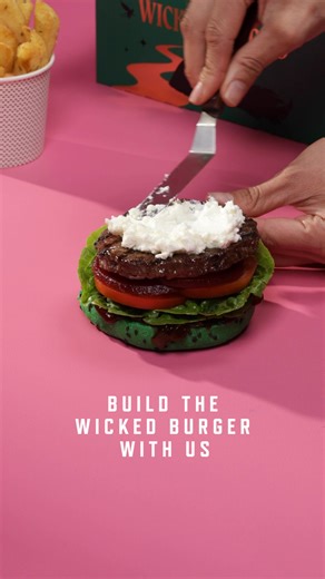 The NEW limited edition Wicked Burger stacked with flavours that fly 👉 grass fed, free-range beef patty on a green bun with Meredith Dairy Goat Cheese, caramelised onion, beetroot, tomato, cos lettuce & herbed mayo. Served in a limited edition box. Available for a short time, only at Grill'd. Tuck in and taste the magic ✨ | Grill'd
