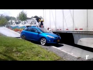 Car, tractor trailer collide on 17K