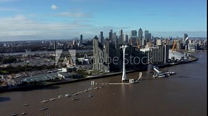 Aerial view of Emirates Air Line cable cars. The service is the UK's first urban cable car running across the Thames from the O2 to the Excel centre.