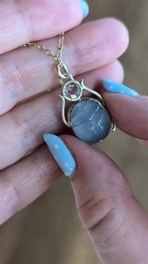 26 reactions · 3 comments | The ethereal translucence of the carved blue chalcedony that Judi Powers used to make this scarab feels otherworldly in a way that is perfect for a creature that humans have regarded as sacred for thousands of years. The scarab holds a rose cut diamond aloft like the sun - a fitting tribute to an insect the ancient Egyptians saw as the divine manifestation of the morning sun. | Diamonds in the Library | Facebook