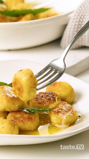 There's nothing better than a simple garlic butter sauce on fluffy, carby morsels of gnocchi. Full recipe: https://www.taste.com.au/recipes/crispy-gnocchi-garlic-butter-recipe/pbsvj2nf | Taste.com.au