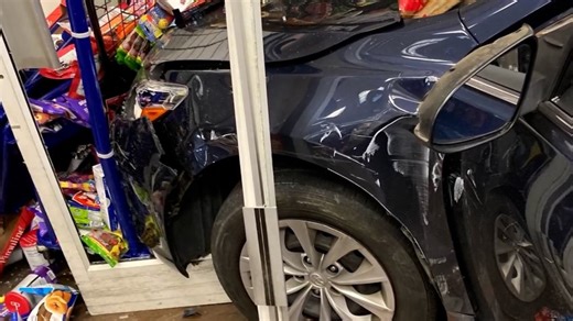 Man drives car into store after argument with employee