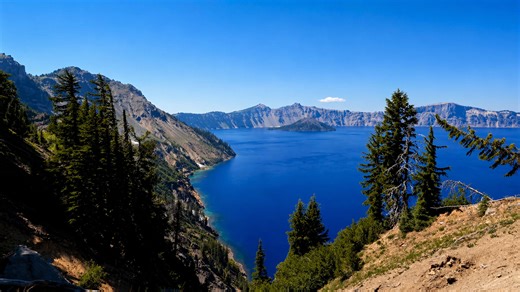 Crater Lake Oregon Wizard Island and blue waters (4K)