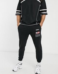 Pull&Bear NASA sweatpants with print and piping in black | ASOS
