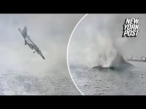 New footage shows moment military fighter jet crashes into San Diego Bay as pilots eject safely
