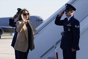 Harris relents on muting debate microphones