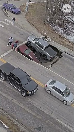 Omaha traffic camera captures sinkhole swallowing two vehicles in Nebraska