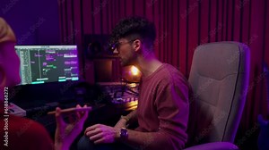 Woman talking with curly man influencer creating digital content