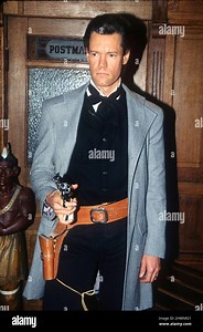 Randy Travis at the Roy Rogers Museum & also doing a shootout video in the surrounding hills in Apple Valley, CA, 1995  Credit: Ron Wolfson / Rock Negatives / MediaPunch Stock Photo - Alamy