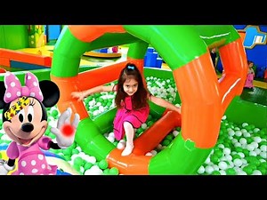 Emily Having Fun at the Playground with her doll