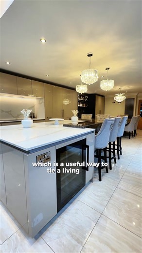 Cohesion in colour and material is key to a well-designed kitchen. Here, the bar area follows the same palette as the main space, allowing the entire room to feel connected and easy to move through. #BespokeDesign #KitchenInspo #InteriorDesign #ModernLiving