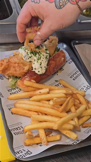 Our Crispy Cod Roll is a mouthful!!朗 Crispy battered cod, stuffed into a buttermilk bread roll, laden with our minted mushy peas and topped with a generous helping of our homemade tartare sauce, chives and a few extra scraps  Served with fries of course. A proper fish butty. Catch this at @cutleryworks any day from 11:30am or @the.batch.house any day from 12pm  #fishbutty #codroll #seafoodroll #fishandchips #yorkshirefood | Butcher & Catch | Facebook